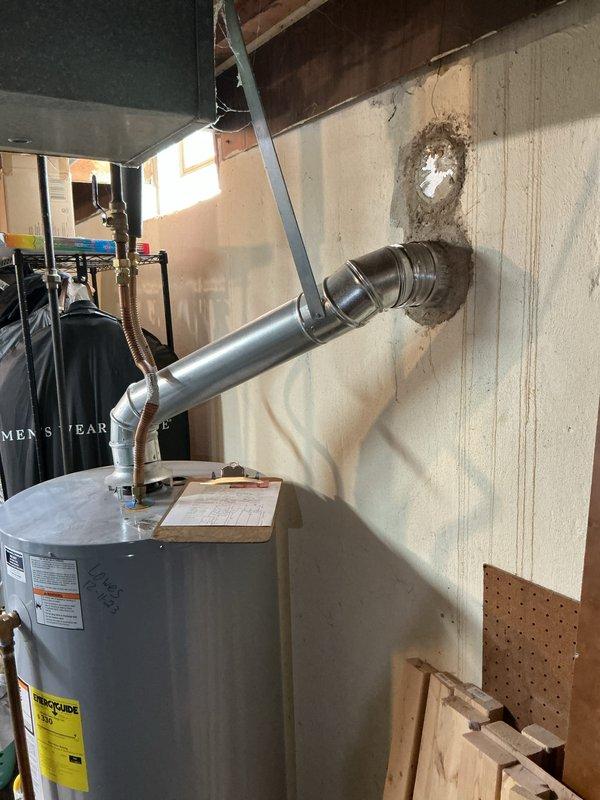 Responded to service call for non-operational blower motor on a 20-year-old Lennox furnace located in basement. Upon inspection, determined that due to age of unit and extent of necessary repairs, provided comprehensive estimate for complete furnace replacement system. Documented existing equipment condition including furnace cabinet, ductwork connections, venting configuration, and water heater proximity for replacement planning purposes.