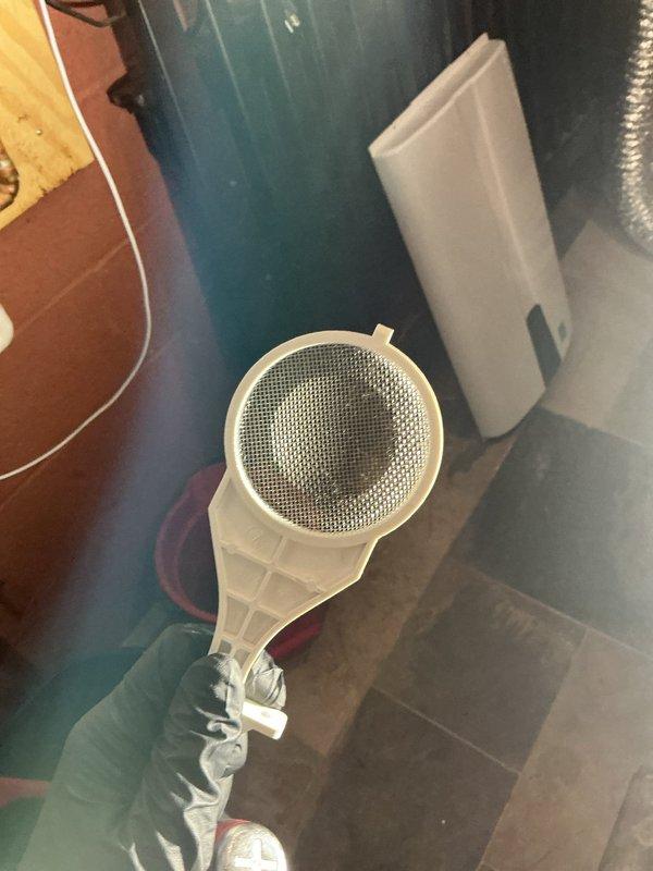 Completed repair service on Navien tankless water heater system. Retrieved replacement part from Munch Supply Madison Heights under PO#1363955, installed component, and verified proper system operation with digital control panel displaying normal readings.