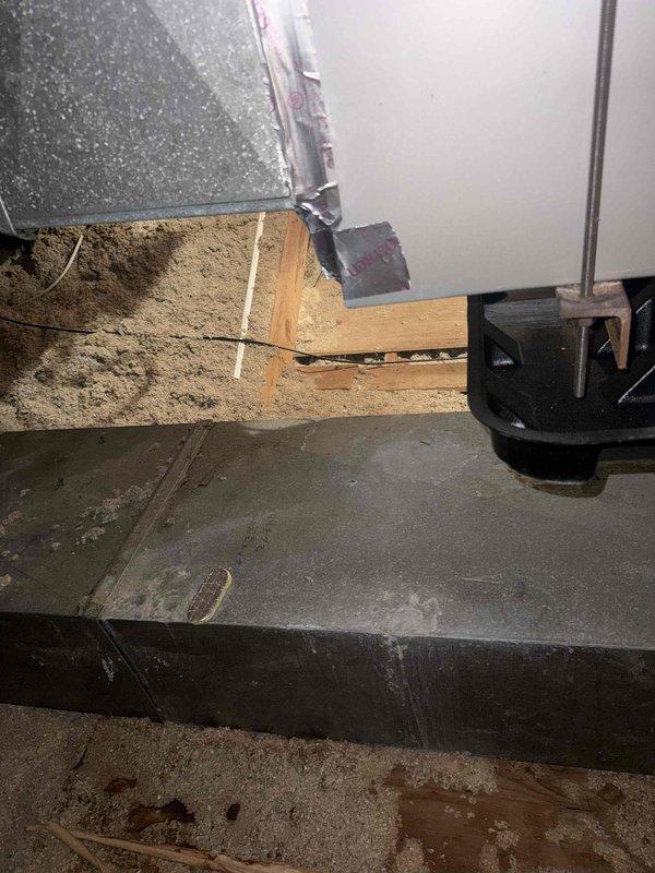 Responded to urgent water leak call for six-year-old AC system located in attic. Upon arrival, inspected attic-mounted air handler and identified clogged condensate drain line causing water overflow and ceiling damage below unit. Cleared blockage from primary drain line, verified proper drainage flow, and tested secondary drain pan for integrity. System remained operational throughout service and was cooling properly. Recommended monitoring ceiling area for any additional moisture concerns and advised scheduling preventive maintenance to avoid future drainage issues.