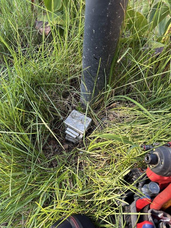 Responded to service call for non-functioning outdoor electrical lamppost. Upon inspection, discovered compromised wiring at the lamppost base and traced circuit back to main electrical panel. Assessed existing wiring infrastructure within wall cavity, identifying tangled and improperly organized conductors requiring attention. Evaluated lamppost fixture and underground feed wiring for damage, wear, and code compliance to determine whether repair or full replacement would be most appropriate solution.
