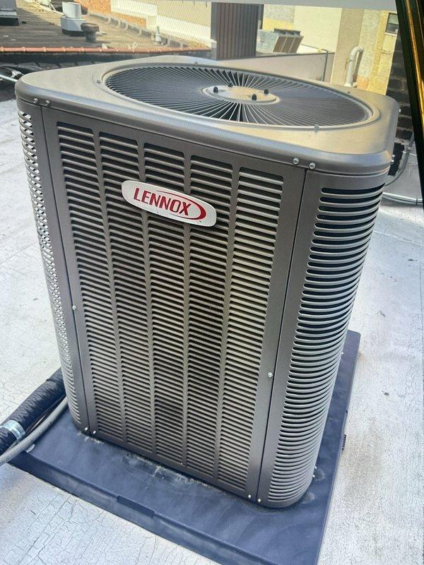 Responded to service call for rooftop unit experiencing refrigerant line freeze-up issues. Performed diagnostic assessment of Lennox commercial A/C unit, taking temperature readings that measured 52°F at the evaporator coil assembly. Replaced faulty motherboard control as requested and inspected refrigerant lines, ductwork connections, and overall unit operation to identify root cause of freezing condition.