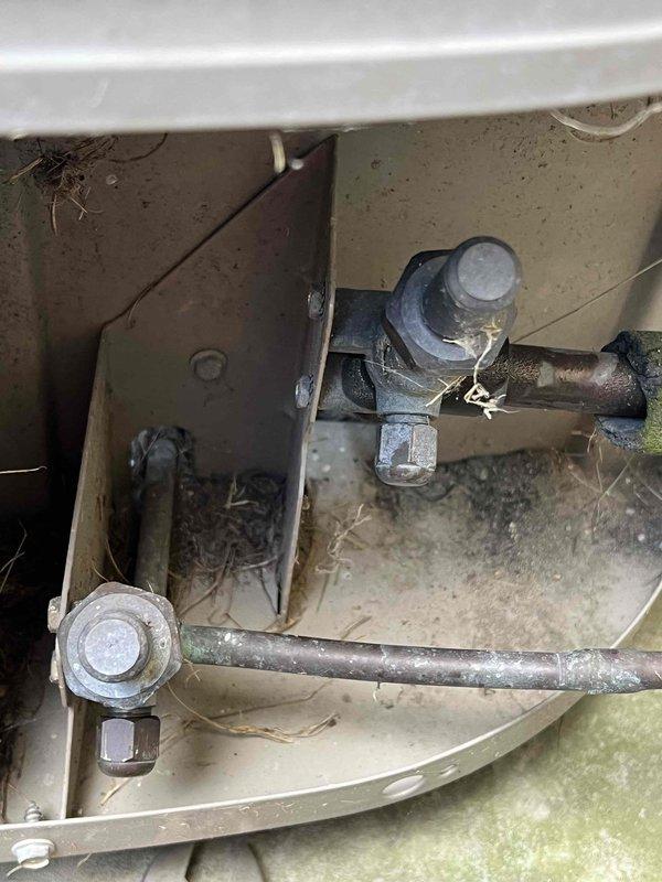 Responded to call for water leaking from furnace during air conditioning operation on a 10+ year old unit located in basement. Upon inspection, identified clogged condensate drain line causing water backup and overflow from the evaporator coil drain pan. Cleared blockage from condensate line using appropriate tools and verified proper drainage flow. Inspected evaporator coil assembly, drain pan, and associated components for damage or additional concerns. Tested system operation in cooling mode to confirm water is now draining properly through condensate line without leakage. Unit operating as designed with no further water discharge issues observed.