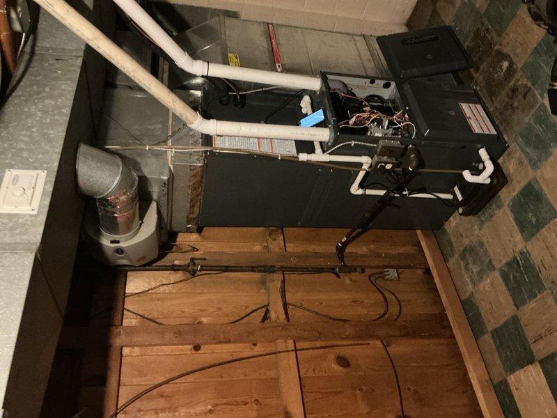 Performed comprehensive air conditioning tune-up and inspection for customer enrolling in maintenance plan. Inspected basement-mounted air handler unit, verifying electrical connections, internal components, and condensate drain lines for proper operation. Evaluated outdoor condensing unit, checking fan motor operation, refrigerant levels, and overall system performance to ensure optimal cooling efficiency for the upcoming season.