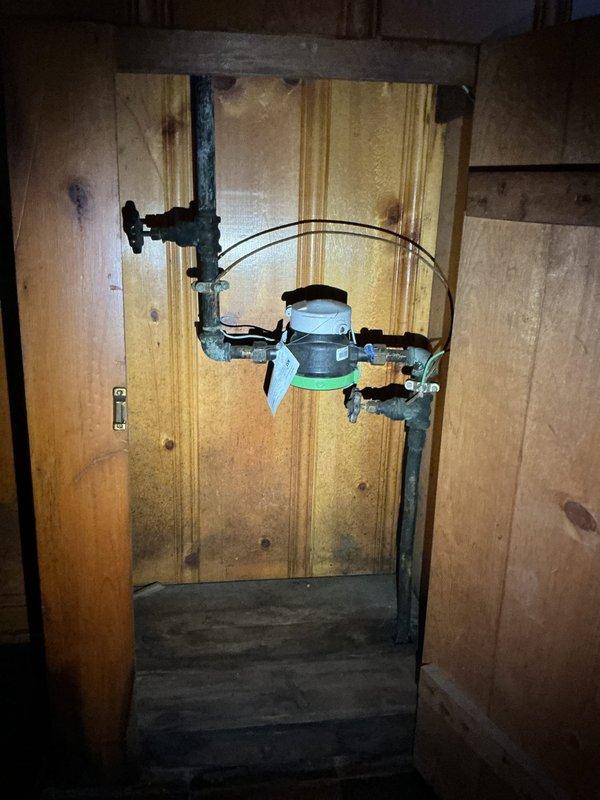 Responded to a low water pressure complaint affecting the bathroom sink. Upon inspection, diagnosed reduced flow caused by a clogged aerator and sediment buildup in the supply lines. Installed a whole-house water filter system on the main water line to address ongoing sediment issues and prevent future pressure loss. Verified proper water pressure restoration at all fixtures following installation. The existing P-trap assembly and drainage components were found to be in good working condition with no leaks detected.