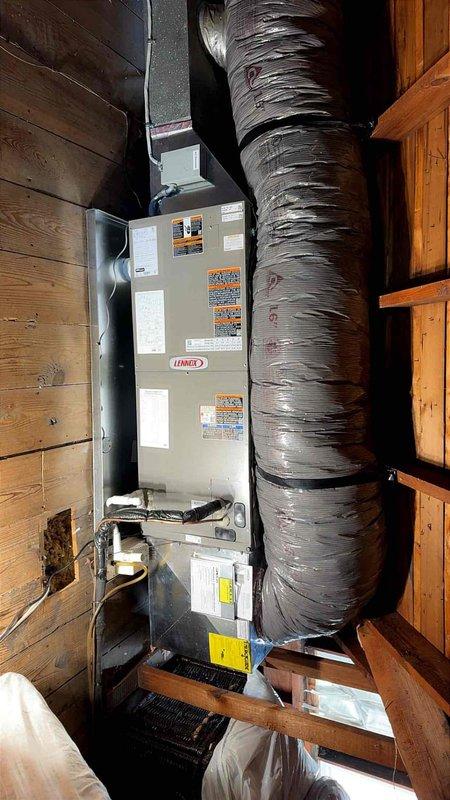 Completed full HVAC system installation including new Lennox air handler mounted vertically in attic space with insulated flex ductwork, condensate wet switch, and drain pan. Installed outdoor condensing unit on concrete pad with refrigerant line set, performed refrigerant flush, and ran insulated copper lines along exterior wall. System tested and operational upon completion.