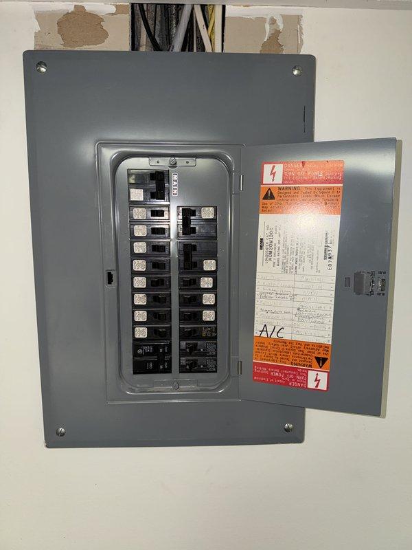 Completed full HVAC system installation including 70,000 BTU furnace, 2-ton air conditioning unit with rear placement, humidifier, and Sensi thermostat. Performed electrical reconnection work, installed new breaker panel circuits for equipment, and mounted exterior disconnect and meter connections on brick exterior wall. Mechanical and electrical permits were obtained, and system qualifies for utility rebates upon completion.