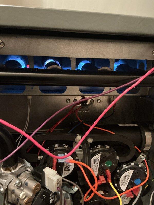 Responded to service call for reported gas leak on Daikin furnace system. Upon arrival, performed comprehensive gas leak detection inspection of all connections, burner assembly, gas valve, and supply piping. Utilized combustible gas detector to identify leak source at burner manifold connection. Shut down system and isolated gas supply for safety. Tightened manifold connection and replaced faulty gasket seal. Pressure tested all gas connections and verified no additional leaks present. Inspected burner flames for proper blue combustion pattern and confirmed all burners igniting correctly. Verified proper operation of all safety controls and limit switches. System restored to full operation with no gas leaks detected and proper flame characteristics observed.