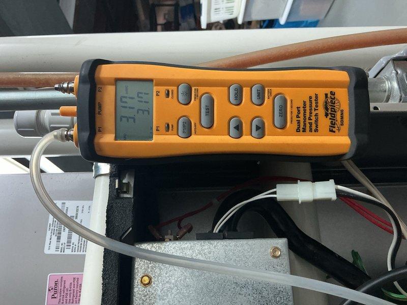 Completed comprehensive Gold Plan AC inspection and maintenance service on residential HVAC system. Accessed indoor air handler unit, inspected internal components including blower assembly, electrical connections, and wiring harnesses for proper operation and safety compliance. Utilized Fieldpiece digital diagnostic instrument to measure and verify system performance parameters including temperature differential and operational readings across refrigerant lines. All electrical connections, wire terminals, and safety controls found secure and functioning within manufacturer specifications. System operating efficiently with no deficiencies noted at time of service.