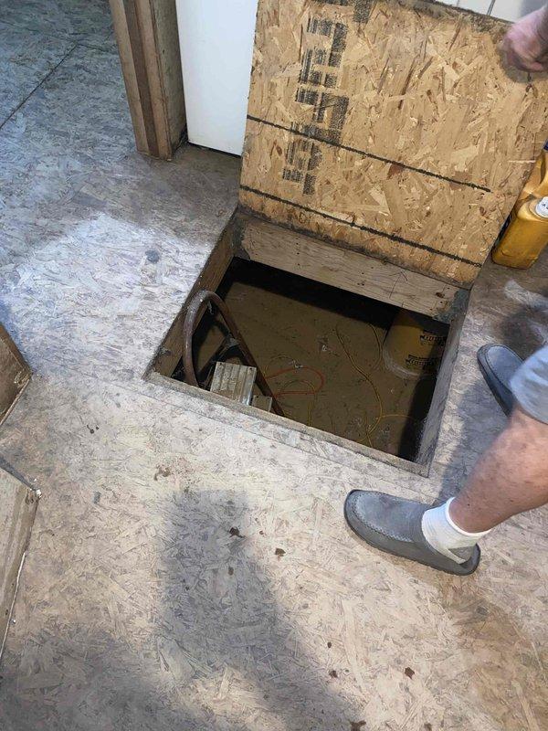Conducted comprehensive site assessment for full HVAC system installation in residential property with no existing equipment. Evaluated basement area and crawl space access for optimal furnace placement, noting floor construction and available utility connections. Documented existing conditions including unfinished space, electrical infrastructure, and water presence in subfloor area to determine equipment specifications and installation requirements for both heating and cooling systems, with primary focus on furnace installation per homeowner preference.