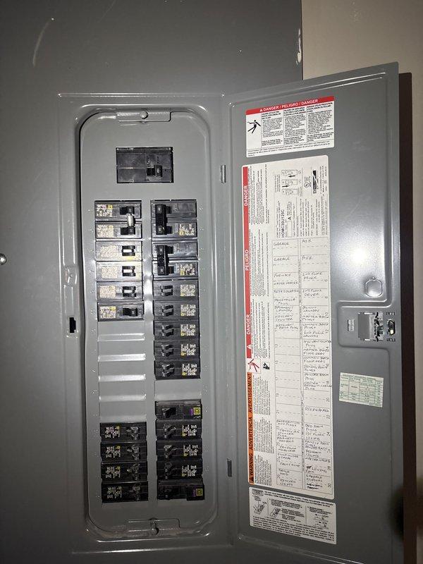 Conducted site assessment for electric vehicle charging station installation. Evaluated existing electrical panel capacity and circuit breaker configuration to determine feasibility for dedicated EV charger circuit. Additionally inspected bathroom ventilation system where damaged wiring was reported and documented panel conditions for quote preparation.