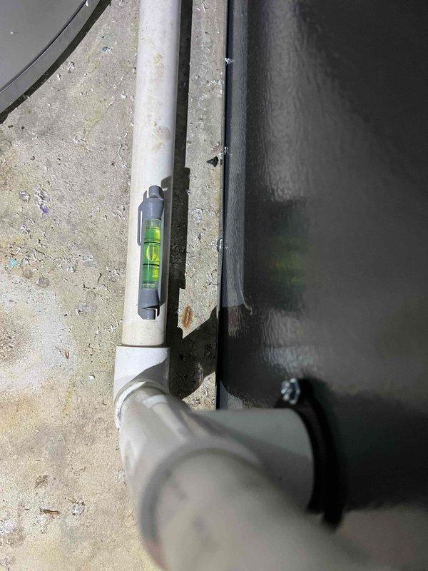Completed comprehensive NSP AC inspection on 3-year-old air conditioning system located in basement and connected to furnace. Performed standard maintenance checks including verification of refrigerant lines, condensate drainage system, and overall equipment operation. All components were assessed and found to be functioning within normal parameters, with proper leveling confirmed on drainage lines.