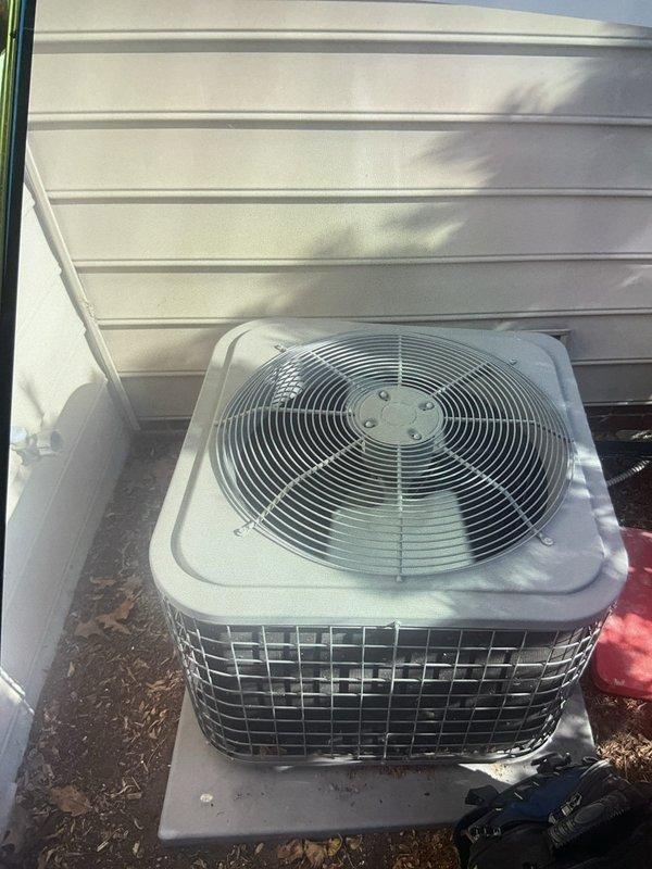 Responded to service call for air conditioning unit making strange noise while still operating. Performed diagnostic inspection of outdoor condenser unit located at basement level. Inspected fan assembly, compressor, and all mechanical components for abnormal sounds or wear. Measured supply air temperature at 71°F and verified unit was cooling properly. Examined condenser coil, fan motor, and protective grille for debris or damage. Unit found to be operating within normal parameters with no immediate mechanical concerns identified. Recommended continued monitoring of any unusual sounds and scheduled follow-up if noise persists or worsens.