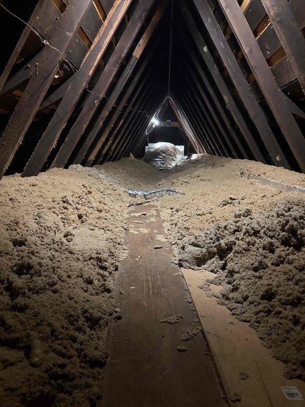 Responded to service call for 10-year-old Unico A/C system in attic with no airflow issue. Upon inspection, discovered condensate pump failure preventing proper drainage. Cleared clogged condensate line and tested pump operation. Verified system airflow restored and unit cycling properly. Condensate drain system now functioning correctly with proper discharge.