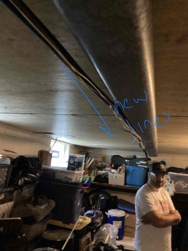 Responded to service call for central air conditioning system not cooling and fan making excessive noise. Upon inspection of basement HVAC equipment, assessed existing air handler, furnace, and associated ductwork system. Provided comprehensive replacement estimate for complete HVAC system upgrade due to equipment age and operational failure, including new air handler unit, refrigerant lines, and necessary connections to existing infrastructure.
