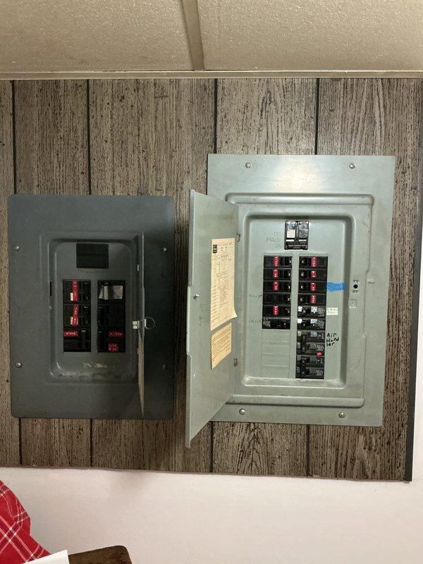 Conducted on-site evaluation for generator installation estimate at residential property with natural gas fuel source. Assessed existing electrical panel configuration and breaker capacity to determine integration requirements for new generator system. Documented electrical infrastructure including dual-panel setup and available circuit capacity to support automatic transfer switch installation and generator connection.