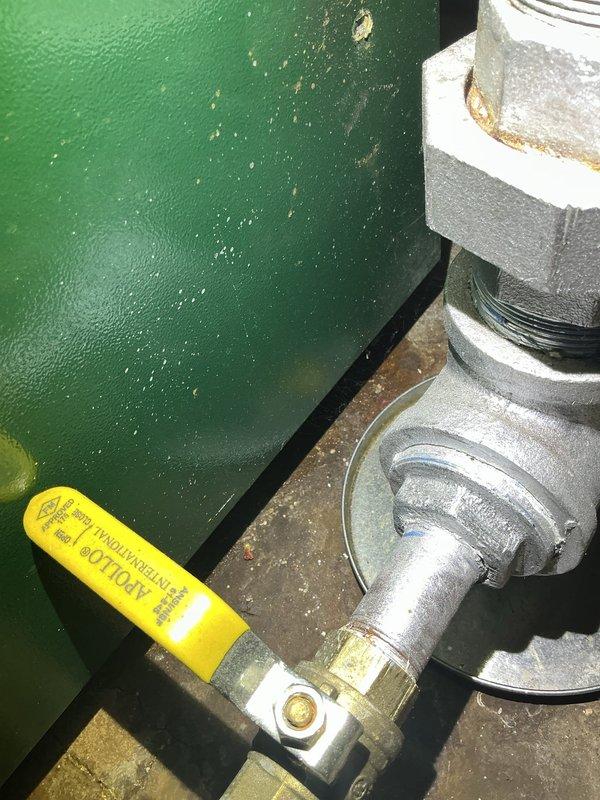 Responded to service call for reported boiler leak on 10-year-old unit located in basement. Upon inspection, identified active leak at threaded pipe connection near boiler manifold assembly. Utilized borescope camera to perform internal inspection of heat exchanger, revealing significant corrosion and scale buildup on interior surfaces. Documented findings with photographic evidence showing deteriorated condition of internal components and compromised pipe fittings. Tagged affected plumbing connections and advised on necessary repairs to address both the immediate leak and underlying corrosion issues within the heat exchanger.