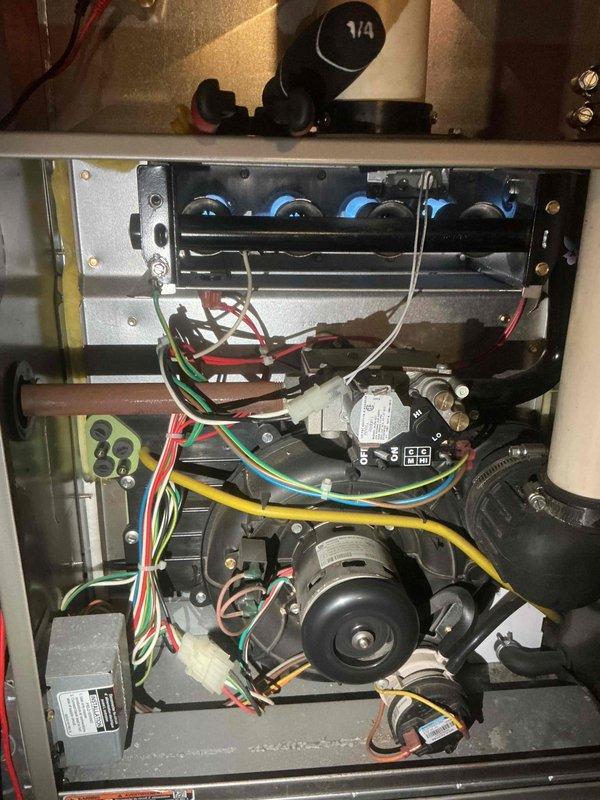 Completed comprehensive Gold-level furnace and air conditioning inspection on two residential HVAC units aged 17 years and 10 years, both located in basement. Performed thorough examination of Lennox outdoor condenser unit, assessing coil condition, fan operation, and exterior cabinet integrity; noted normal weathering and dirt accumulation consistent with unit age. Conducted detailed internal inspection of furnace components including blower motor assembly, gas valve operation, electrical connections, control module, and wiring harnesses; verified proper configuration and functionality of all mechanical and electrical systems. Both units operating as expected at time of inspection with no immediate service needs identified.