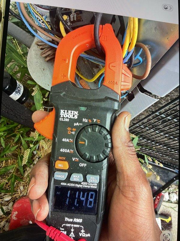 Responded to no cooling complaint on 9-year-old air conditioning system. Performed diagnostic testing and measured supply air temperature at 152°F, confirming lack of cooling. Measured system amperage at 11.48A using clamp meter on outdoor unit wiring. Identified refrigerant or compressor issue preventing proper cooling cycle. Also inspected humidifier pad per customer request during service call.