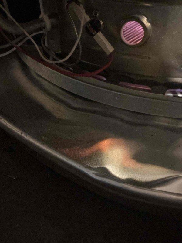 Responded to city code violation for water heater installation missing required drain pan. Installed compliant drip pan beneath water heater per 2024 municipal code requirements. Documented installation with photographs for inspector review and code compliance verification.