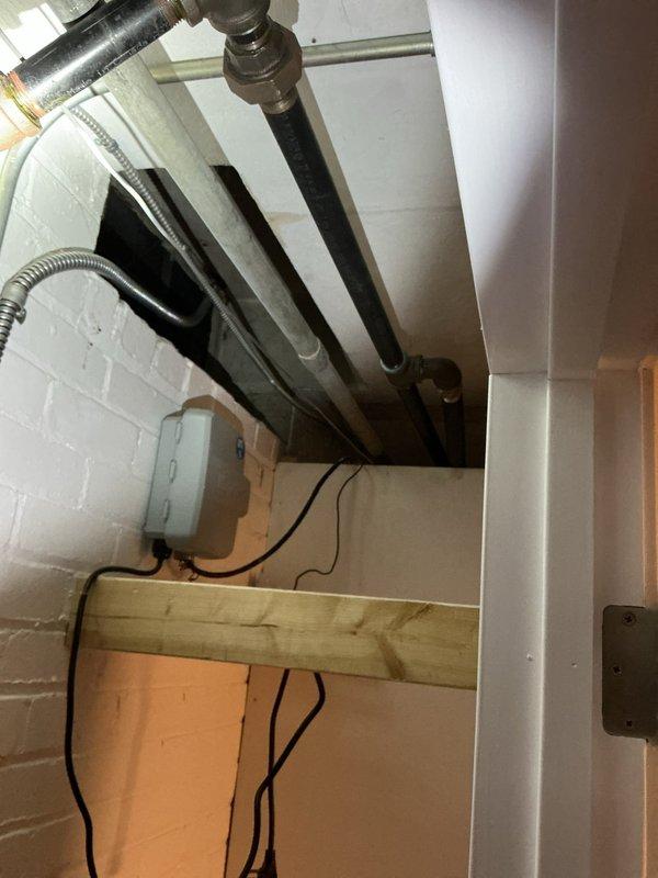 Installed new gas line from existing supply to dryer room in basement utility area. Routed black iron pipe along ceiling joists and down wall to dryer location, ensuring proper support and clearance from electrical conduits and HVAC ductwork. Connected gas line to dryer with approved flexible connector and performed pressure test to verify system integrity and absence of leaks.