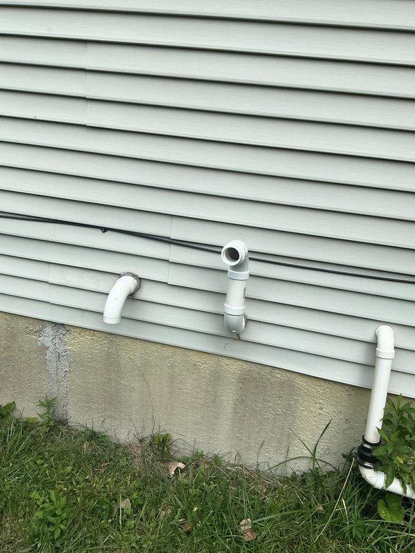 Completed installation of 70,000 BTU furnace with new PVC venting system routed through exterior wall. Installed additional gas line to accommodate water heater connection and performed electrical reconnection. Mounted and programmed new Emerson programmable thermostat with wall patching and finishing work at installation location. Submitted mechanical and electrical permit applications and registered system for utility rebate eligibility.