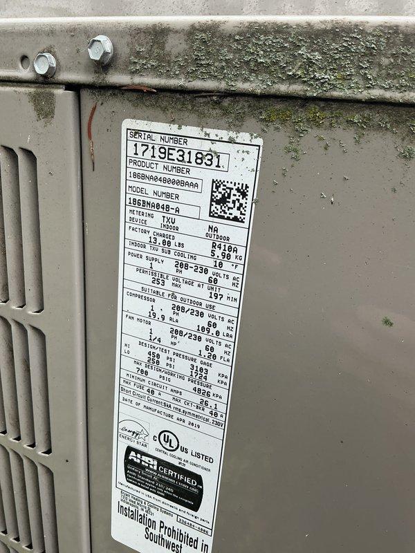 # Concise Summary

Completed Gold AC inspection on 2-year-old residential system with 1 outdoor condensing unit and 2 furnaces, all equipment operational. Performed comprehensive multi-point inspection including burner operation verification with visual confirmation of proper flame characteristics, electrical component assessment, and exterior unit evaluation of model 18GN848-A (R410A refrigerant system). Documented system conditions through photographic evidence showing active burner assembly with proper blue flame pattern, control components, and outdoor unit specifications.

# Detailed Technical Description

Performed comprehensive Gold AC inspection on residential HVAC system consisting of one air conditioning unit and two gas furnaces, all approximately 2 years old with air handler located in basement. Conducted thorough multi-point inspection protocol on all equipment.

**Furnace Inspection:**
Removed access panels and inspected internal components of both gas furnaces. Verified 