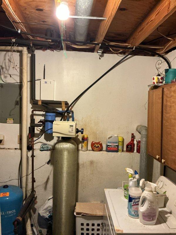 Responded to service call for intermittent breaker tripping in basement utility area. Inspected electrical panel and associated wiring serving mechanical equipment including water heater, well pressure tank, and HVAC systems. Identified loose connection at breaker terminal causing arcing and intermittent power loss. Tightened all connections at affected breaker, verified proper wire seating, and tested circuit under load to confirm stable operation without tripping.