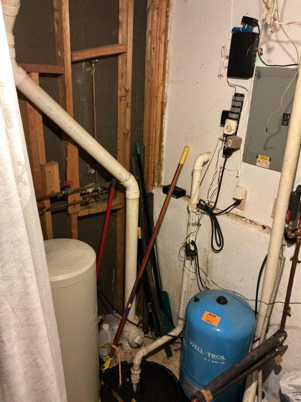 Responded to service call for intermittent breaker tripping in basement utility area. Inspected electrical panel and associated wiring serving mechanical equipment including water heater, well pressure tank, and HVAC systems. Identified loose connection at breaker terminal causing arcing and intermittent power loss. Tightened all connections at affected breaker, verified proper wire seating, and tested circuit under load to confirm stable operation without tripping.