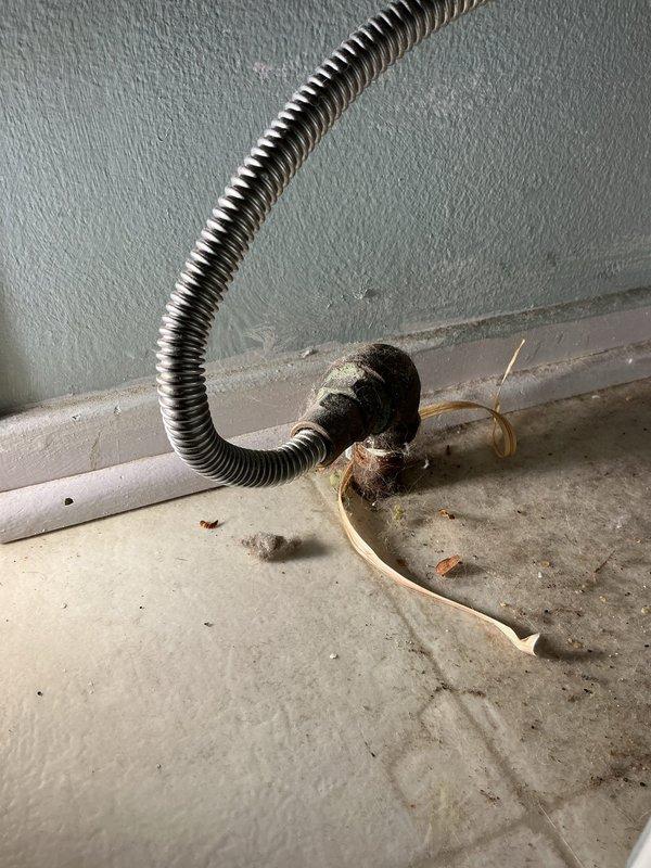 Installed gas shutoff valve on existing gas line to accommodate dryer installation. Accessed gas line in basement area, cut into existing black iron pipe, and installed quarter-turn ball valve with appropriate fittings to provide isolation capability for appliance connection. Tested installation for leaks using approved methods and verified proper operation of shutoff mechanism.