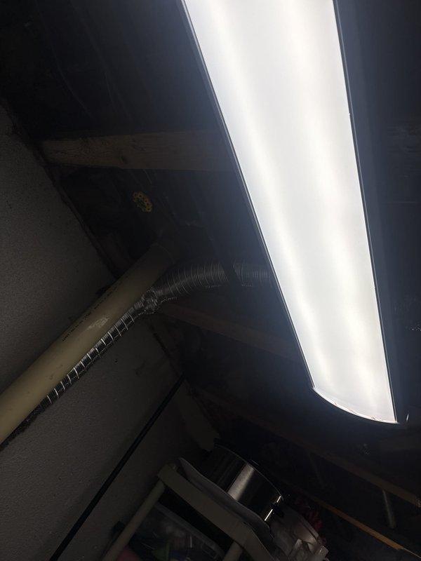 Installed customer-supplied breaker and mounted new fluorescent light fixture in mechanical/utility room. Verified proper electrical connections and tested outlet functionality using digital voltage meter to confirm correct wiring polarity and grounding.