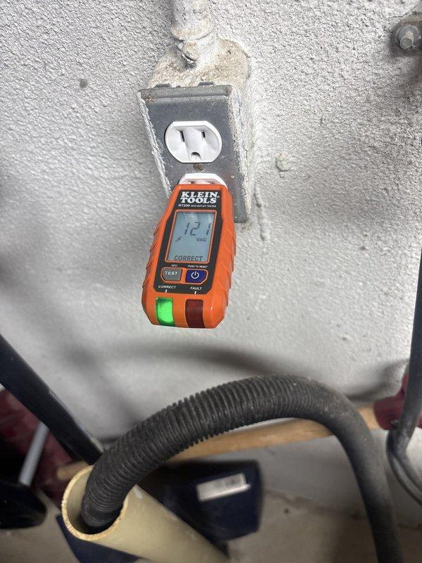 Installed customer-supplied breaker and mounted new fluorescent light fixture in mechanical/utility room. Verified proper electrical connections and tested outlet functionality using digital voltage meter to confirm correct wiring polarity and grounding.