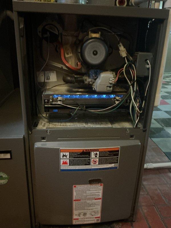 Completed comprehensive tune-up and city certification inspection on 10-year-old furnace system located in basement. Performed full system evaluation including burner assembly, blower motor operation, electrical connections, and safety controls. Inspected and tested humidifier, thermostat functionality, and hot water tank as part of certification requirements. All components found operating within manufacturer specifications, unit approved for city certification required for property sale.