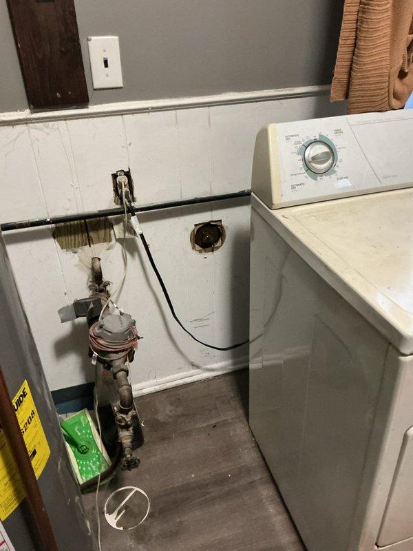 Responded to a bathroom toilet drainage issue that persisted after chemical drain cleaner application. Upon inspection, identified a cracked PVC drain pipe in the plumbing assembly connected to the fixture, which was preventing proper drainage. Replaced the damaged section of gray PVC pipe and rubber gasket at the threaded coupling connection point. Tested the toilet flush mechanism to verify proper drainage and confirmed complete resolution of the blockage issue.