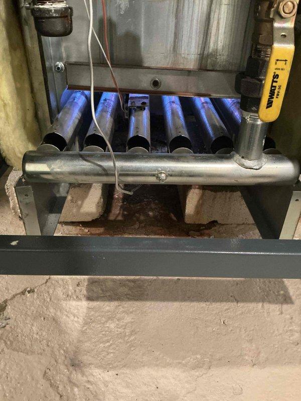 Completed comprehensive Gold Boiler Inspection on 5-year-old hot water boiler system located in basement. Performed thorough visual examination of all boiler components, including heat exchanger tubes with protective coating, cabinet enclosure, piping connections, and associated wiring. Conducted combustion analysis testing using calibrated digital analyzer, measuring Delta T at 17.8°F, carbon monoxide levels at 0.00 ppm, and flue temperature at 63.8°F, confirming safe and efficient operation. Verified proper installation of all mechanical components on concrete foundation, checked levelness of equipment, and inspected all supply and return piping connections for integrity. All system parameters within manufacturer specifications, unit operating safely with no deficiencies noted.