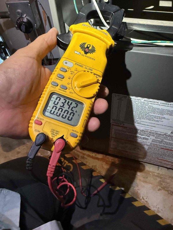 Completed comprehensive Gold Furnace Inspection on 13-year-old furnace unit located in basement. Performed electrical diagnostics using clamp multimeter to verify system performance and electrical draw. Inspection revealed rust and corrosion buildup along interior cabinet seams and access panel edges, indicating moisture exposure over time. All electrical connections, wiring harnesses, and control circuits were examined and found to be operational. Documentation photos captured for maintenance records.