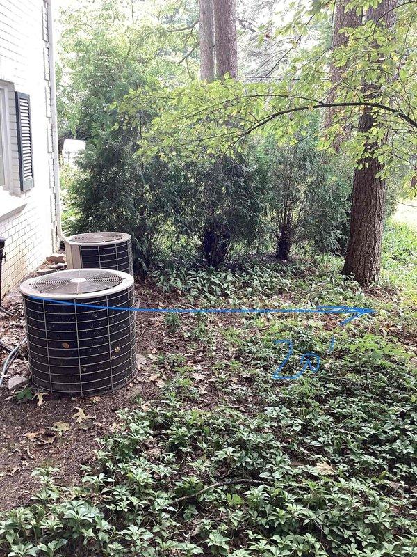 Conducted comprehensive site assessment for dual-zone HVAC system replacement involving two 30-year-old furnaces located in basement and two air conditioning condensers positioned exterior. Evaluated existing equipment configuration, electrical infrastructure including 240V single-phase service panel showing advanced corrosion and rust damage requiring attention during replacement, and outdoor condenser placement adjacent to building foundation in wooded side yard area. Documented current system layout, electrical connections, refrigerant line routing, and condensate drainage paths to develop accurate replacement proposal for proactive system upgrade prior to winter season.