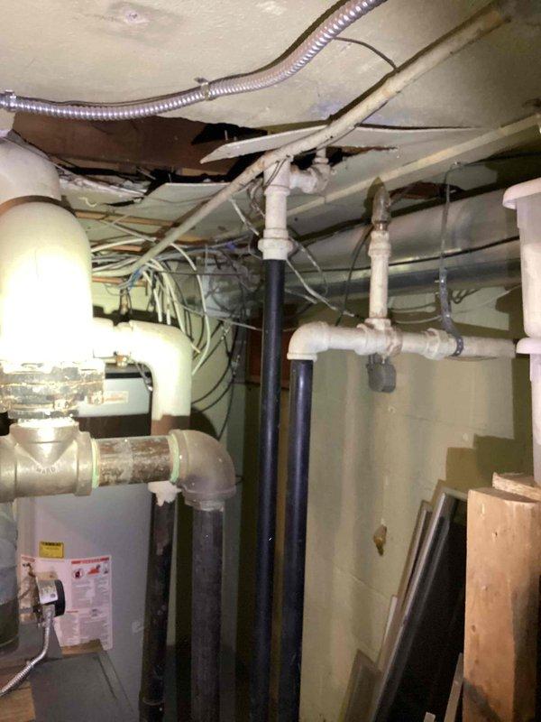 Conducted comprehensive estimate for replacement of 20+ year old natural gas steam boiler system experiencing uneven heat distribution to radiators. Assessed existing steam heating infrastructure in basement utility area and evaluated garage space for potential addition of separate heating and cooling system to condition detached workspace with vehicle storage.