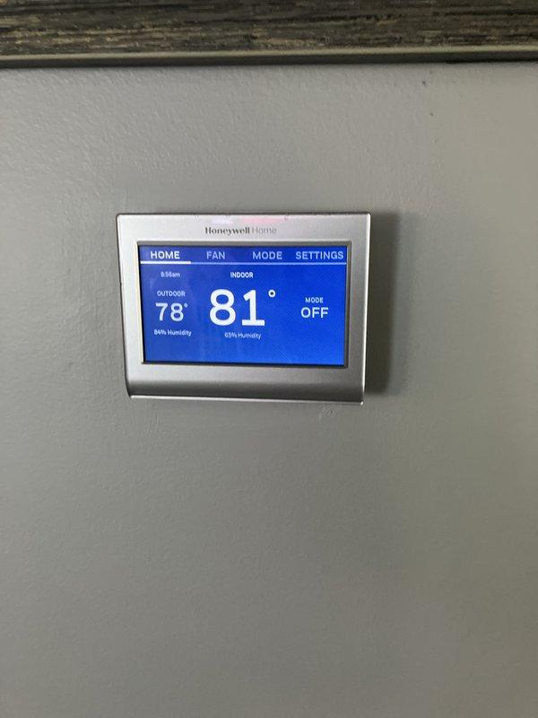 Conducted on-site evaluation for packaged unit cooling system replacement and separate furnace replacement for medium-sized residential property (1500-3000 sq.ft.). Assessed existing basement HVAC installation including furnace/air handler unit, ductwork configuration, and Honeywell Home digital thermostat displaying indoor conditions at 81° with 95% humidity. Documented current equipment specifications and provided separate replacement estimates for cooling and heating systems.