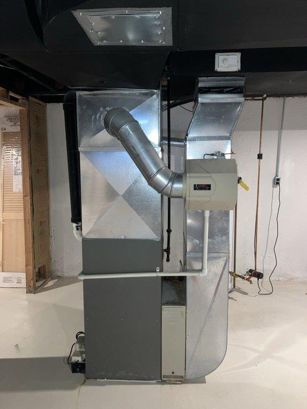 Conducted on-site evaluation for packaged unit cooling system replacement and separate furnace replacement for medium-sized residential property (1500-3000 sq.ft.). Assessed existing basement HVAC installation including furnace/air handler unit, ductwork configuration, and Honeywell Home digital thermostat displaying indoor conditions at 81° with 95% humidity. Documented current equipment specifications and provided separate replacement estimates for cooling and heating systems.