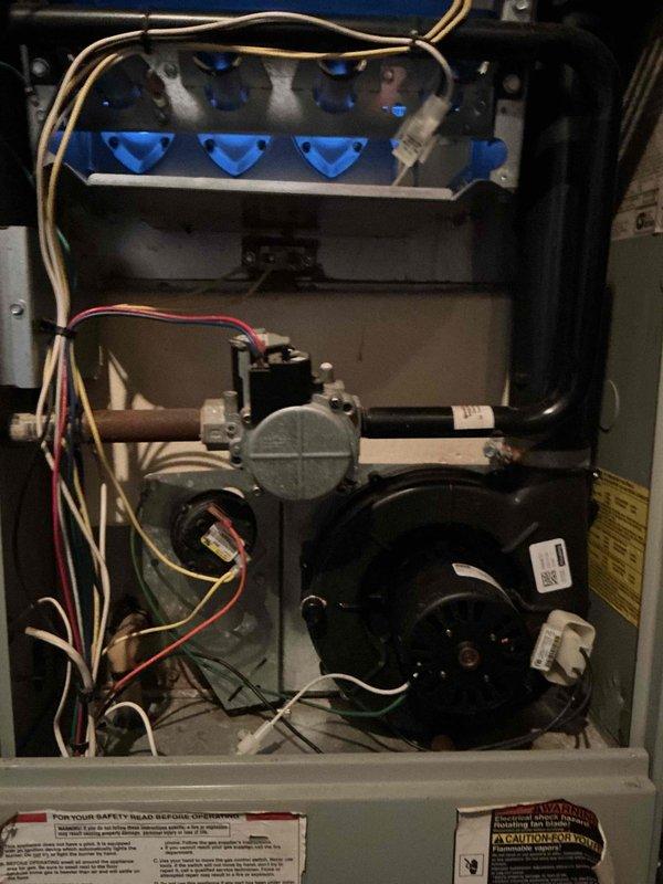 Completed comprehensive city certification inspection on 10-year-old basement furnace system. Performed full tune-up including inspection of burner assembly, blower motor, gas valve, and all electrical connections. Verified proper operation of humidifier, thermostat, and hot water tank. All components found functioning within normal parameters with proper flame characteristics and airflow. System passed city certification requirements for rental property.