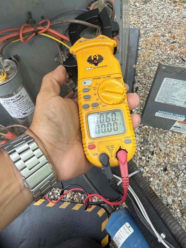 Responded to no cooling complaint on 10+ year old air conditioning unit located in basement. Upon arrival, confirmed outdoor condenser fan motor was operating but compressor was not running. Performed electrical diagnostics using clamp meter and identified failed dual run capacitor preventing compressor from starting. Replaced defective capacitor with proper rated replacement unit. Verified proper amperage draw on both compressor and condenser fan motor circuits. Tested system operation through complete cooling cycle and confirmed unit now providing adequate cooling with all components functioning within manufacturer specifications.