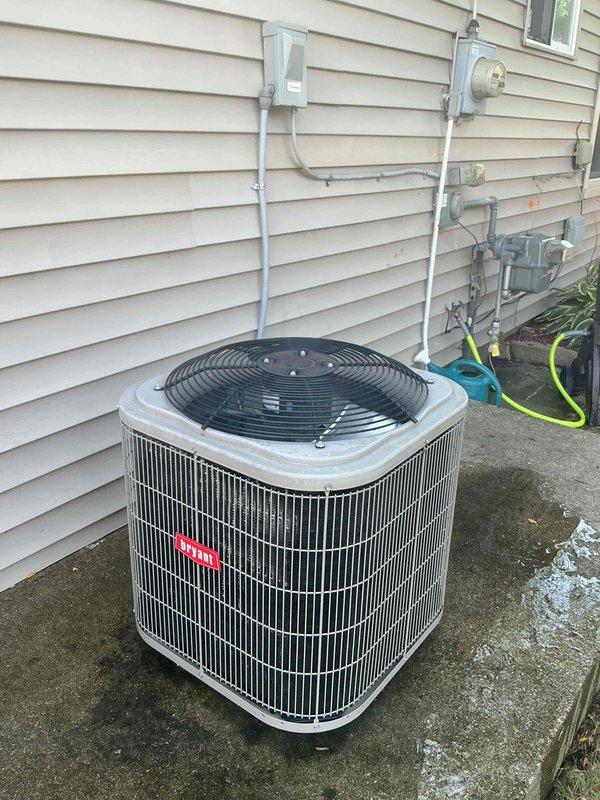 # HVAC Maintenance - Gold AC Inspection

Completed comprehensive Gold-level maintenance inspection on residential HVAC system consisting of a 9-year-old air conditioning unit located in the backyard and a 10-year-old furnace in the laundry room. Both units were found to be operating within normal parameters at the time of inspection.

## Air Conditioning Unit Inspection

Performed thorough examination of outdoor condensing unit positioned on concrete pad adjacent to the residence. Verified proper electrical connections at disconnect box and meter assembly mounted on exterior wall. Inspected cylindrical cabinet and protective fan grille for structural integrity and damage. Confirmed adequate clearance around unit for proper airflow and servicing access. Evaluated condition of refrigerant lines and electrical conduit routing. Assessed concrete pad for levelness and stability, noting normal weathering consistent with unit age. Unit demonstrated proper operational characteristics during in