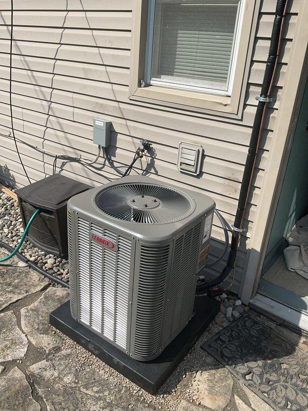 Completed full HVAC system installation including a 70,000 BTU furnace with chimney liner, 2-ton Bryant air conditioning unit, and condensate pump in rear yard location. Coordinated with electrician for required electrical work, obtained mechanical permit, and installed new digital programmable thermostat. System reconnected, tested, and verified operational with AHRI certification number recorded for rebate processing.
