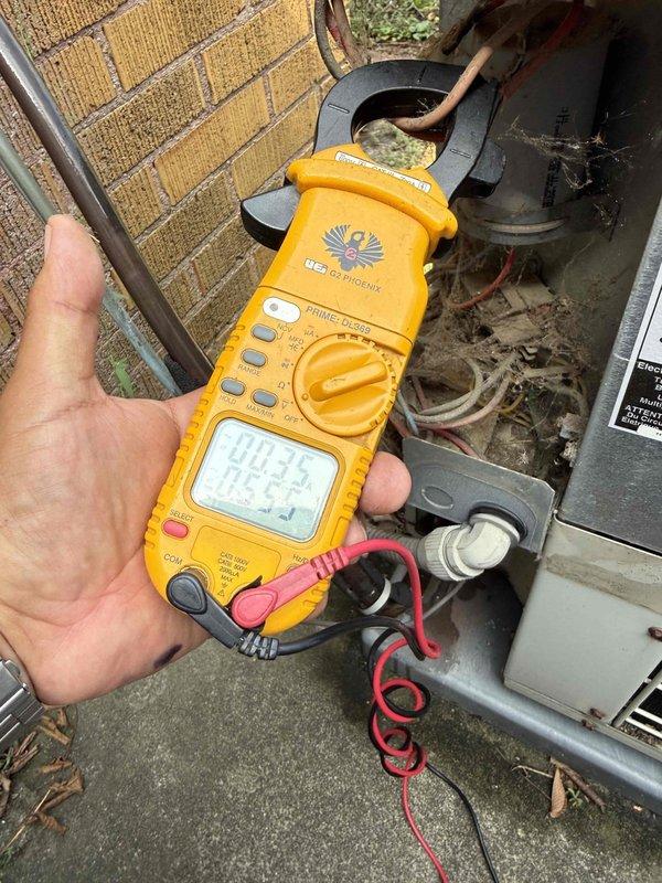 Responded to water leak complaint at condensate pump location on 26-year-old furnace system. Upon arrival, investigated recently installed condensate pump that was experiencing leakage during air conditioning operation. Customer had replaced pump two days prior with same brand and model after experiencing repeated pump failures.

Performed diagnostic inspection of condensate pump assembly and drainage system. Utilized inspection camera to examine condensate drain line for potential blockages, restrictions, or improper pitch that could cause back-pressure on pump. Camera inspection revealed staining and corrosion patterns inside drain line indicating possible drainage issues. Conducted electrical testing of outdoor condensing unit using clamp meter to verify proper system operation and rule out any refrigeration-related condensate production abnormalities. Measured current draw at 0.3 amps during testing sequence.

Identified that leak was likely caused by improper pump installation, in