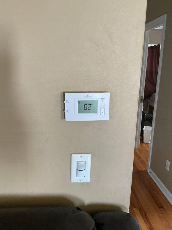 Provided estimate for complete HVAC system replacement including non-operational air conditioning unit and natural gas furnace, both 15-20 years old and located at side of house with air handler in attic utility space. Assessed existing equipment configuration including ductwork, thermostat control system, and current installation accessibility for replacement planning. Documented system specifications and photographed existing equipment to prepare comprehensive replacement proposal for residential comfort system upgrade.