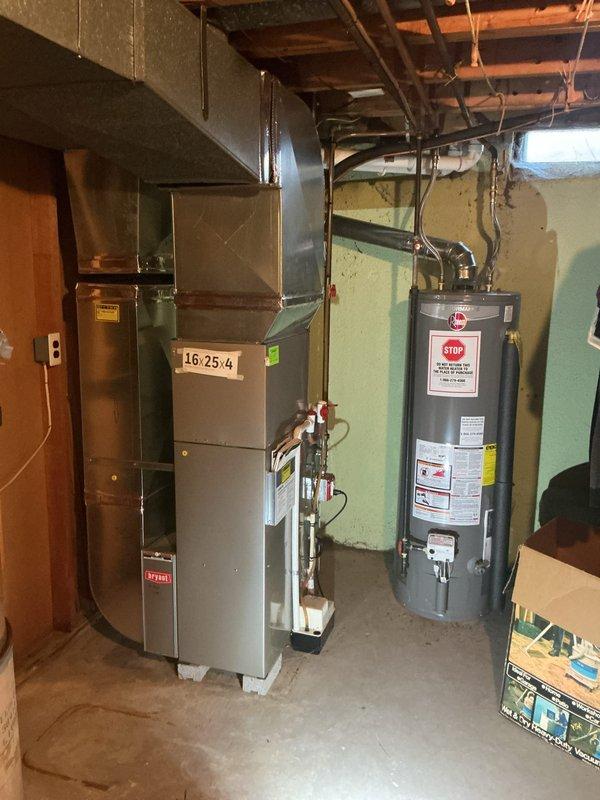 Completed comprehensive Gold-level furnace inspection on 12-year-old Bryant furnace unit located in basement. Performed full system diagnostic including visual inspection of heat exchanger, burner assembly, ignition system, and all safety controls. Verified proper operation of White-Rodgers programmable thermostat, checked temperature differential, and confirmed heating cycle functionality. Inspected all gas connections, flue piping, and condensate drainage system for proper operation and safety compliance. All components found operating within manufacturer specifications with no immediate service needs identified.