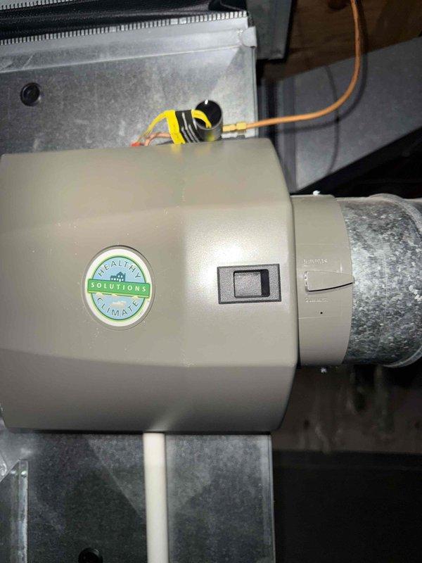 Completed comprehensive tune-up and safety inspection on 17-year-old furnace system located in basement. Performed full system diagnostics, inspected and tested all operational components including heat exchanger, burners, ignition system, and blower assembly. Verified proper operation of Healthy Solutions humidifier unit attached to ductwork and conducted internal camera inspection of flue pipe connections to assess for blockages, deterioration, or excessive buildup. All safety controls tested and confirmed operational within manufacturer specifications.