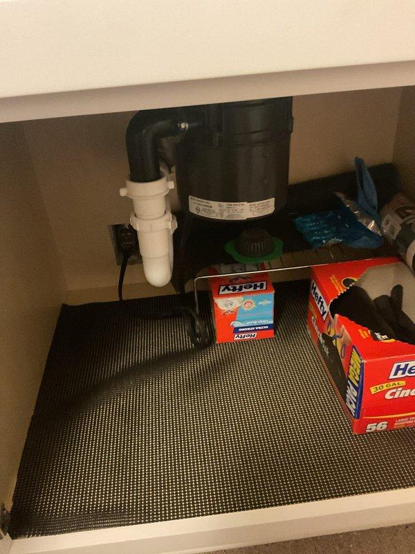 Responded to a service call for a garbage disposal that would not turn on. Upon inspection, diagnosed the unit and verified proper water flow through the kitchen sink drain system. Confirmed the garbage disposal unit, P-trap assembly, and drain connections were properly installed and secured beneath the sink. Tested the system to ensure proper operation and restored functionality to the disposal unit.