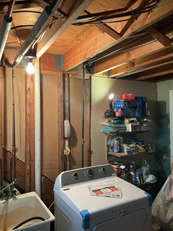 Installed new gas line for gas dryer in basement to replace inadequate aluminum gas connection that prevented dryer reinstallation. Ran proper gas piping from existing supply to dryer location, installed appropriate fittings and connectors, and ensured secure connection meeting code requirements for safe appliance operation.