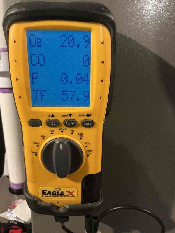 Completed comprehensive Gold-level furnace inspection on a single-unit residential forced-air system located in the basement. Performed combustion analysis using digital analyzer, confirming optimal readings with oxygen at 20.9%, zero carbon monoxide presence, pressure at 0.04, and flue temperature at 57.9°F. Verified system operation on furnace under 10 years old, documented equipment specifications, and captured diagnostic readings for maintenance records.